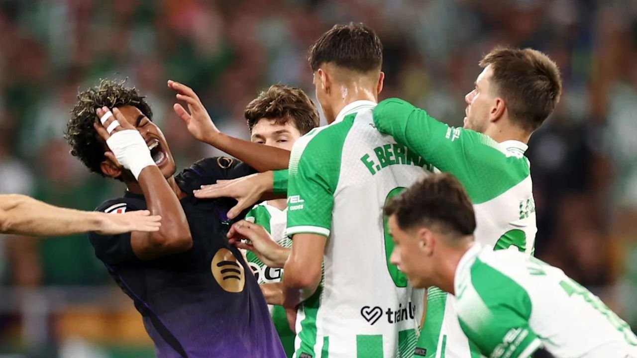 Facundo Bernal and Lamine Yamal clash during Barcelona's 5-2 La Liga victory over Real Betis
