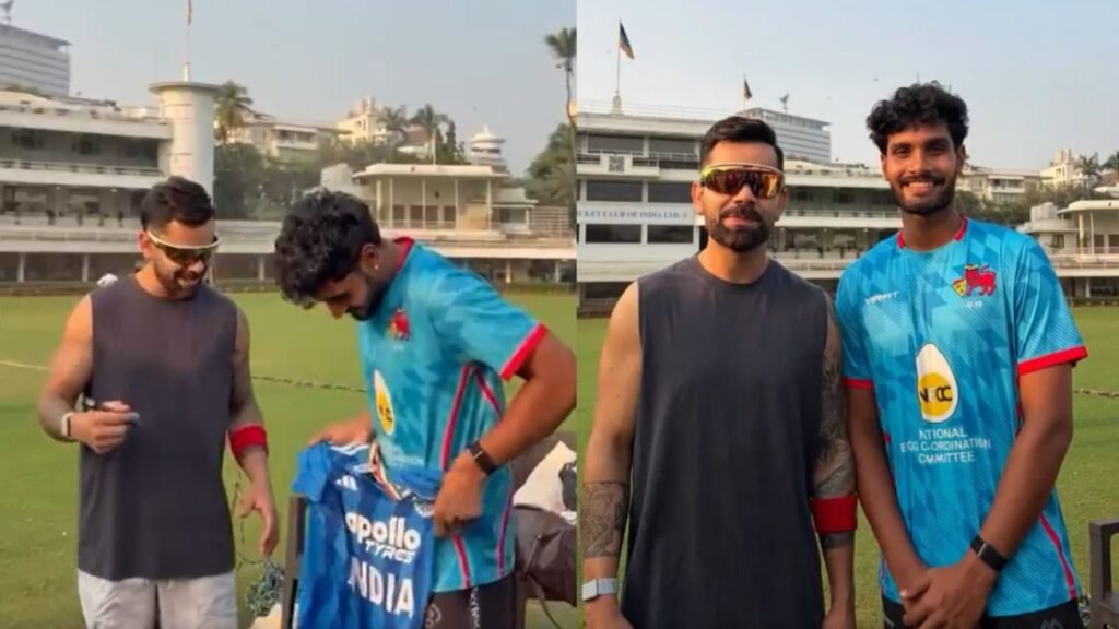 Virat Kohli signs a Team India jersey for a young net bowler during a practice session in Mumbai ahead of the New Zealand ODI series.