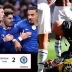 Pedro Neto celebrates scoring for Chelsea against Everton as goalkeeper Emiliano Martinez suffers a head injury during the Premier League match.