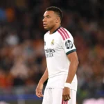Kylian Mbappe celebrates after breaking Lionel Messi’s Champions League appearance record for Real Madrid
