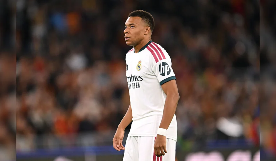 Kylian Mbappe celebrates after breaking Lionel Messi’s Champions League appearance record for Real Madrid
